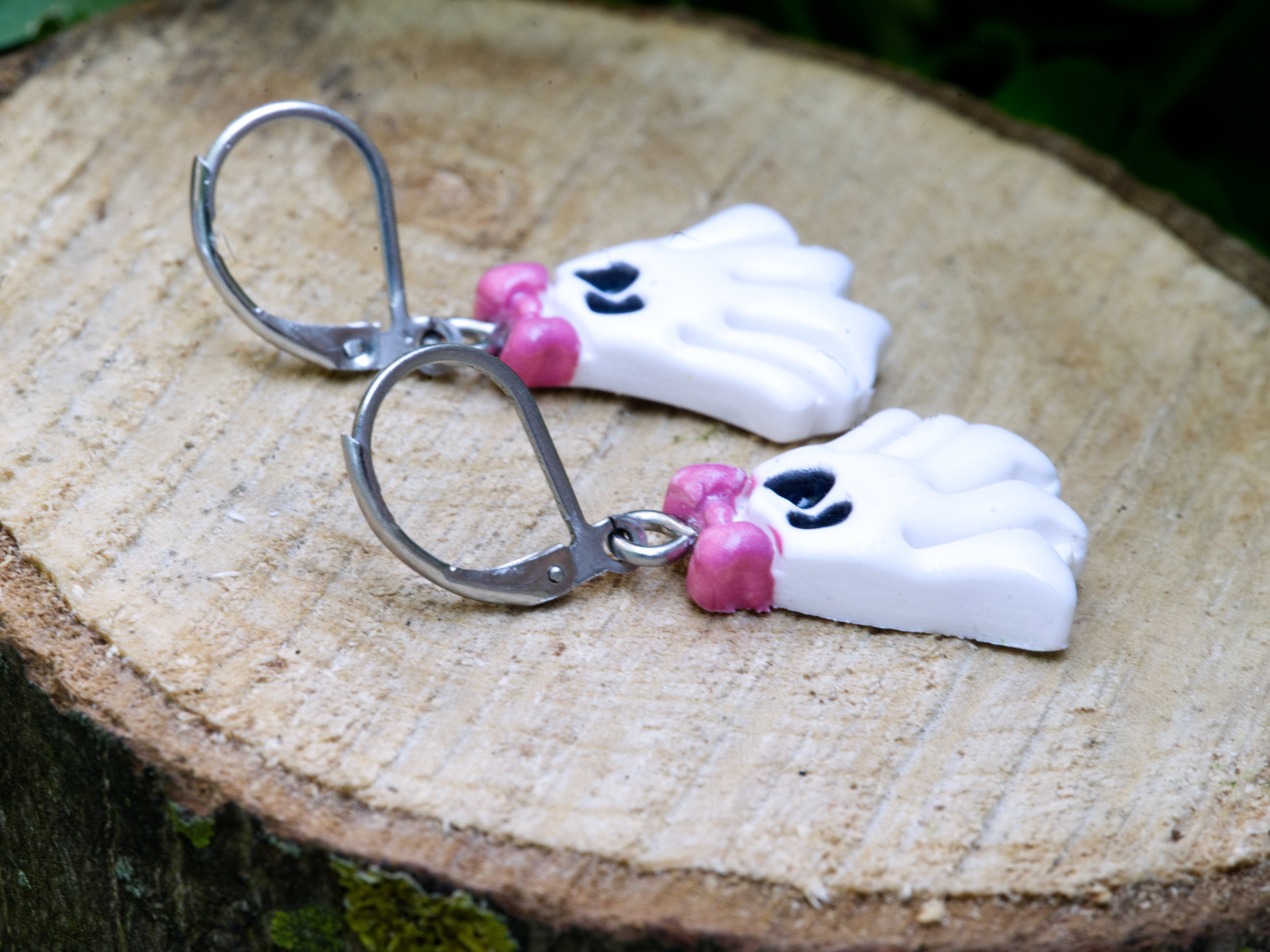 316 grade surgical steel leverback hook on white polymer clay coquette ghost earring with pink bow