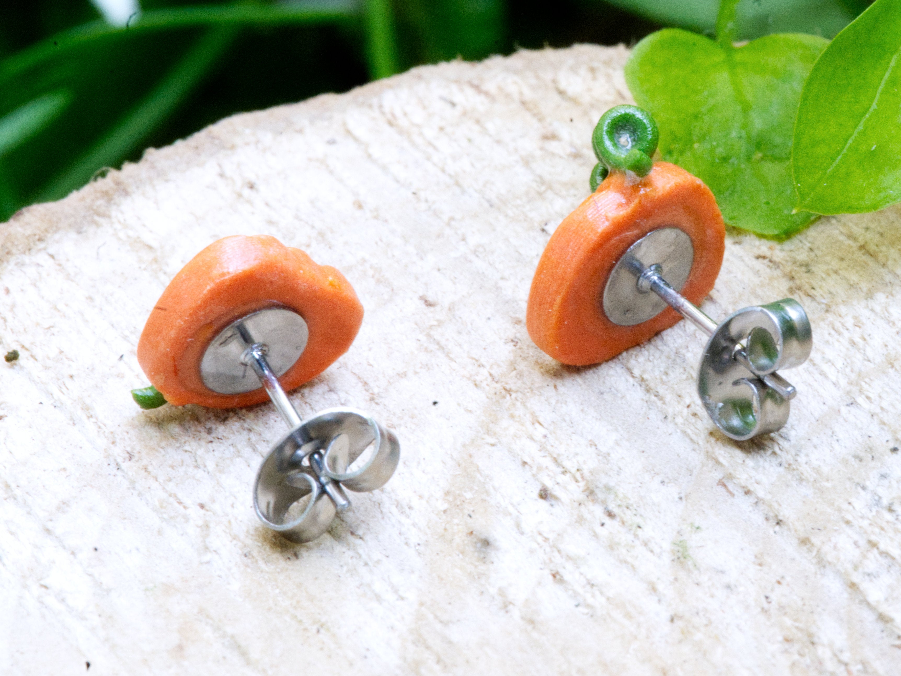 316 grade surgical steel earring post and butterfly back on orange polymer clay pumpkin stud earring