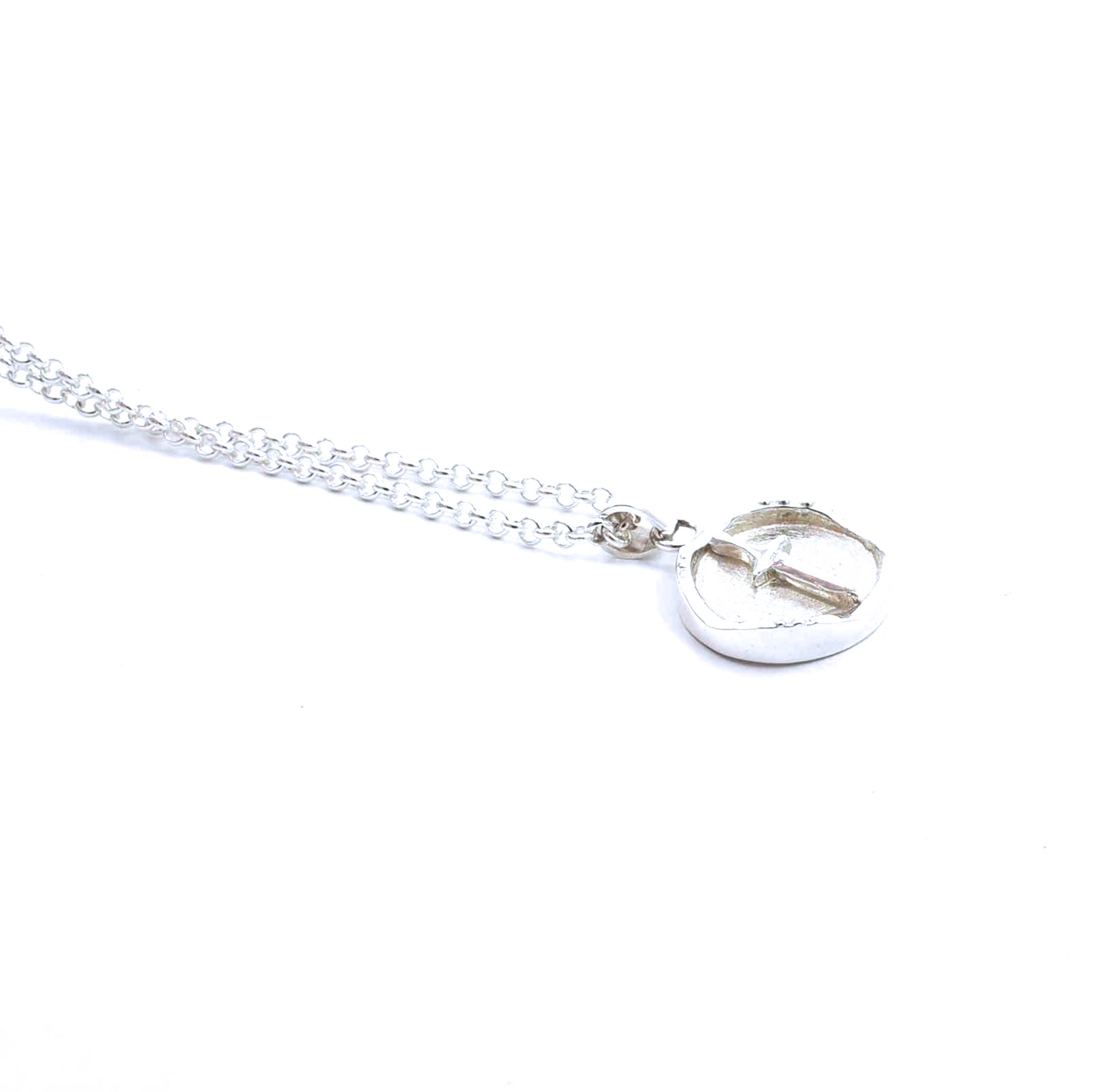 Left side view of sterling silver excalibur pendant