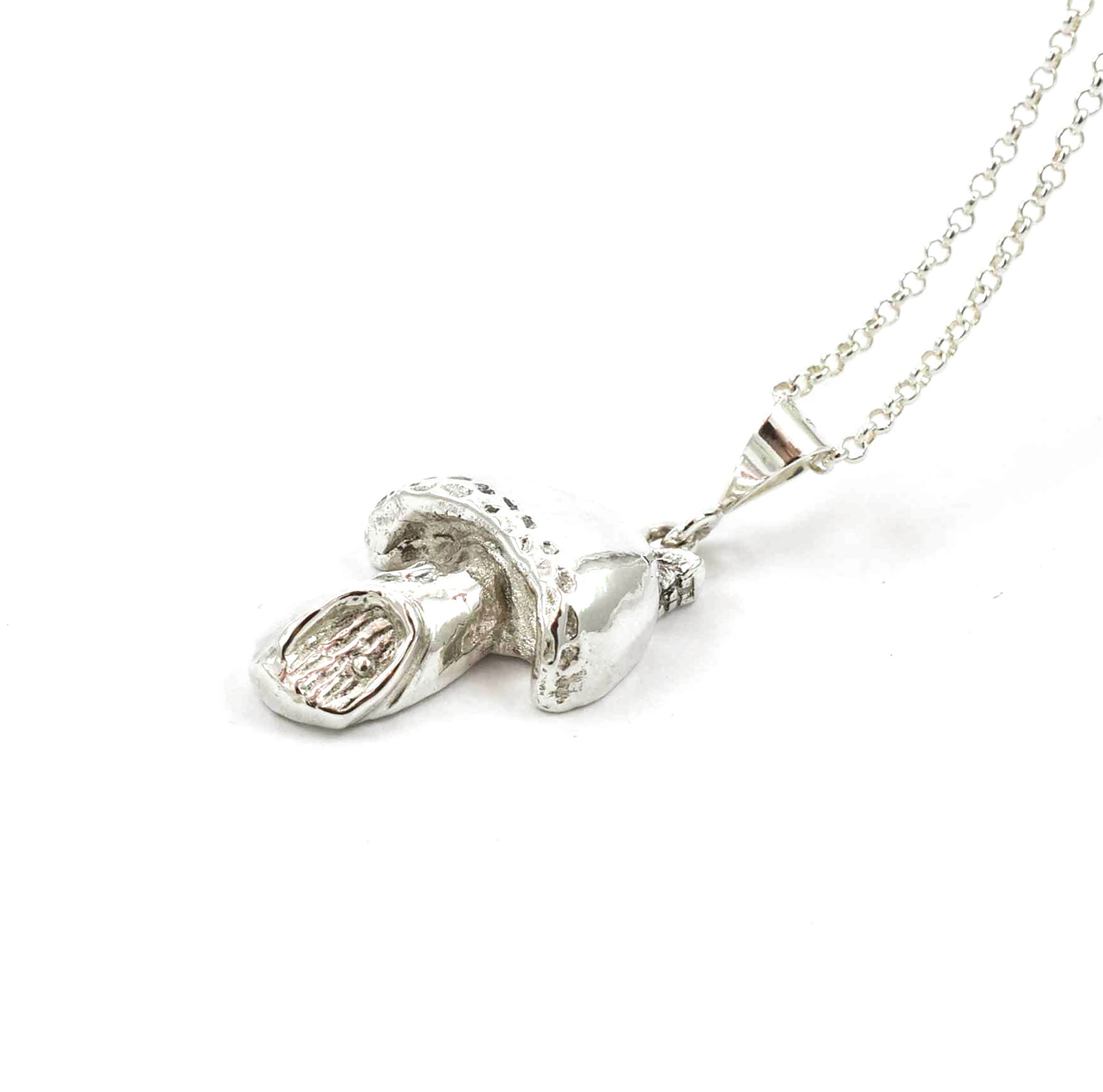 Right side view of sterling silver Faery House pendant