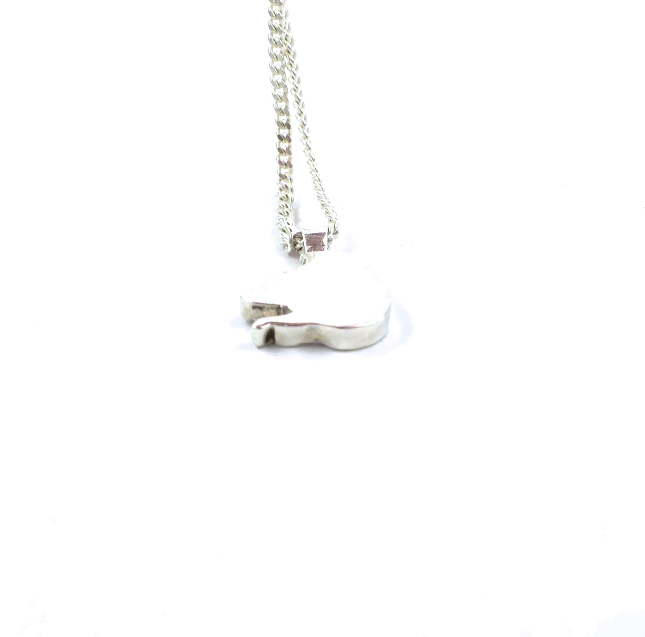 Rear view of sterling silver sleeping dragon pendant