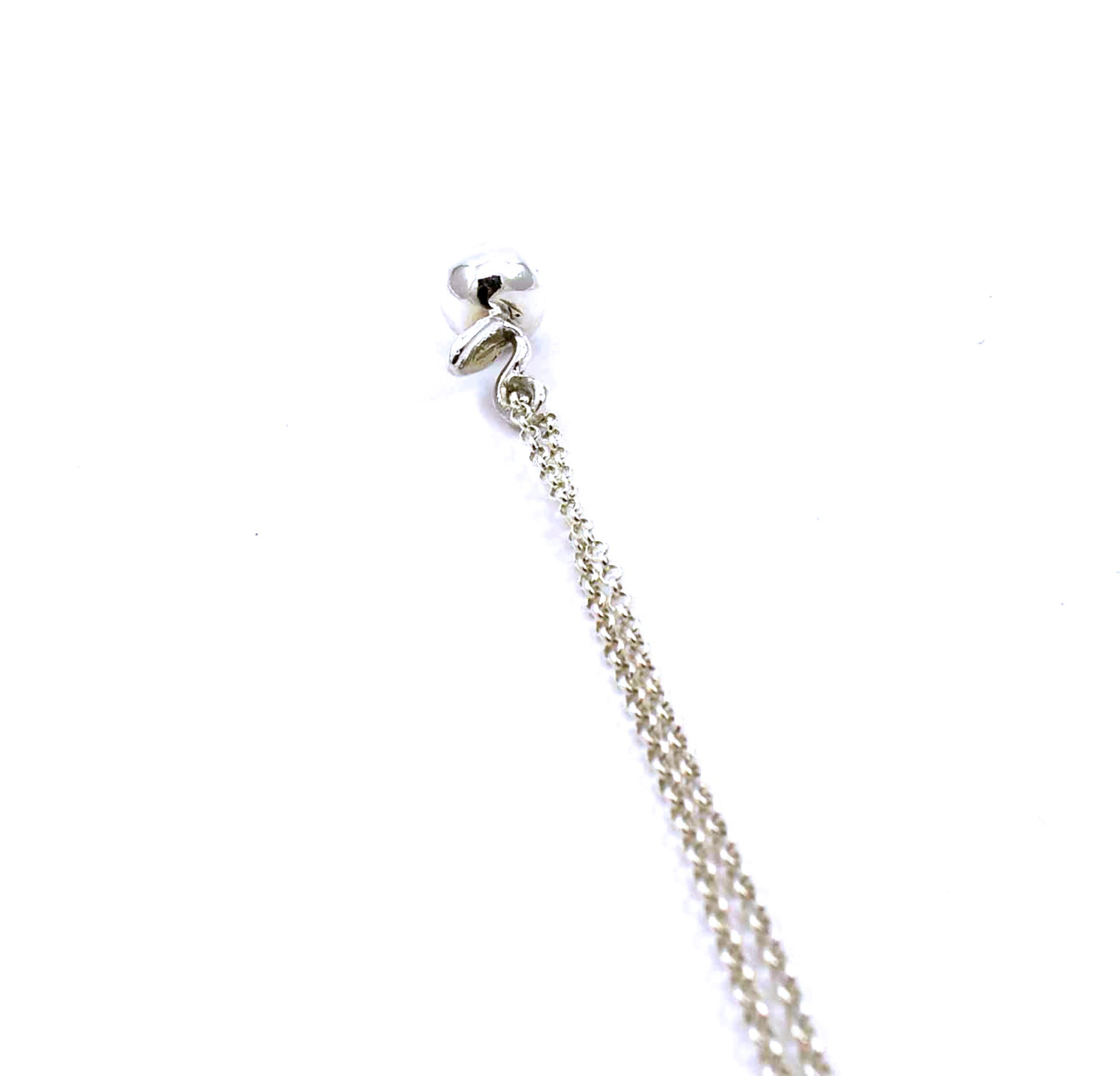 Top view of sterling silver apple pendant