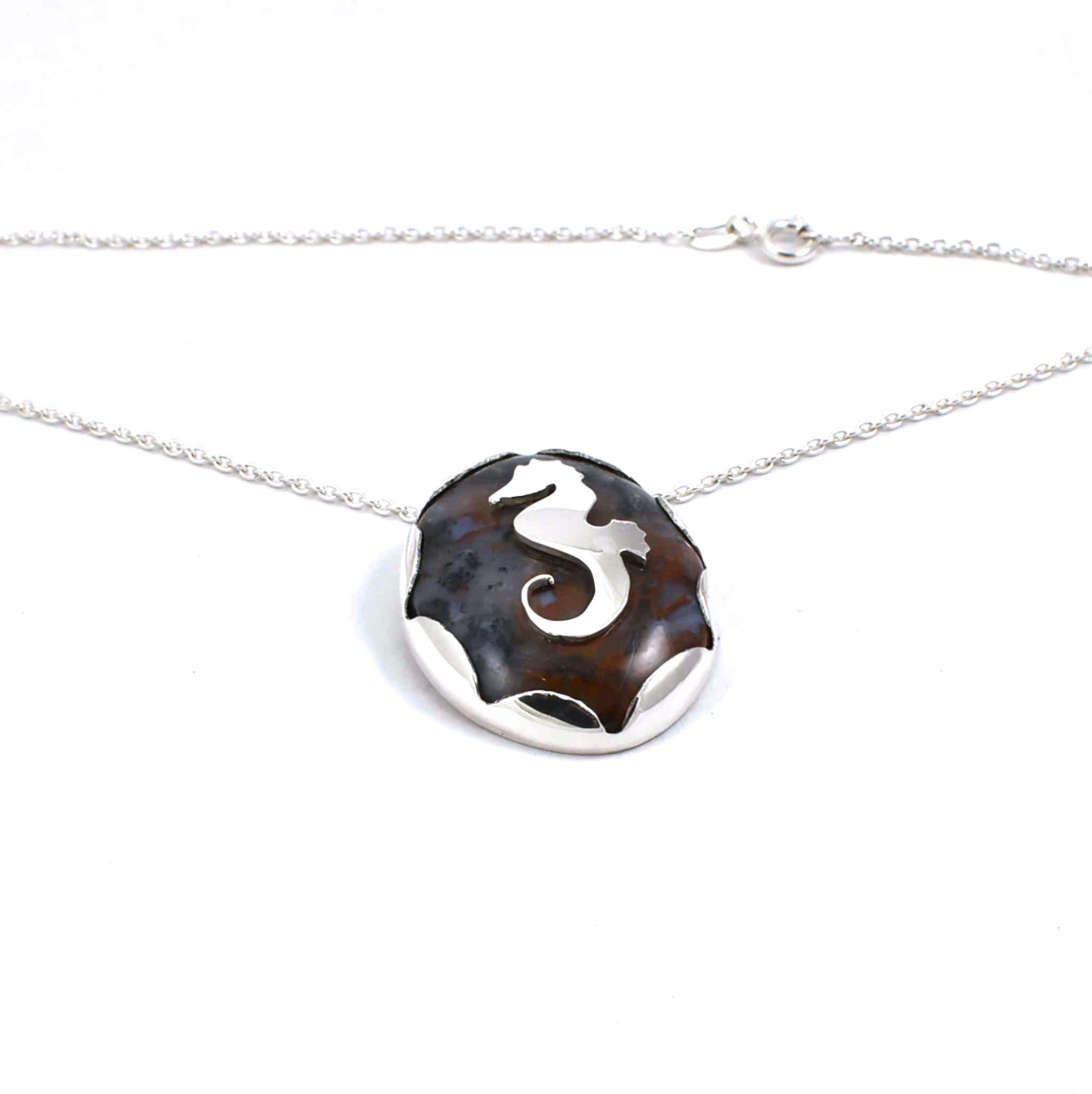 Bottom view of sterling silver agate pendant with seahorse and fish accents