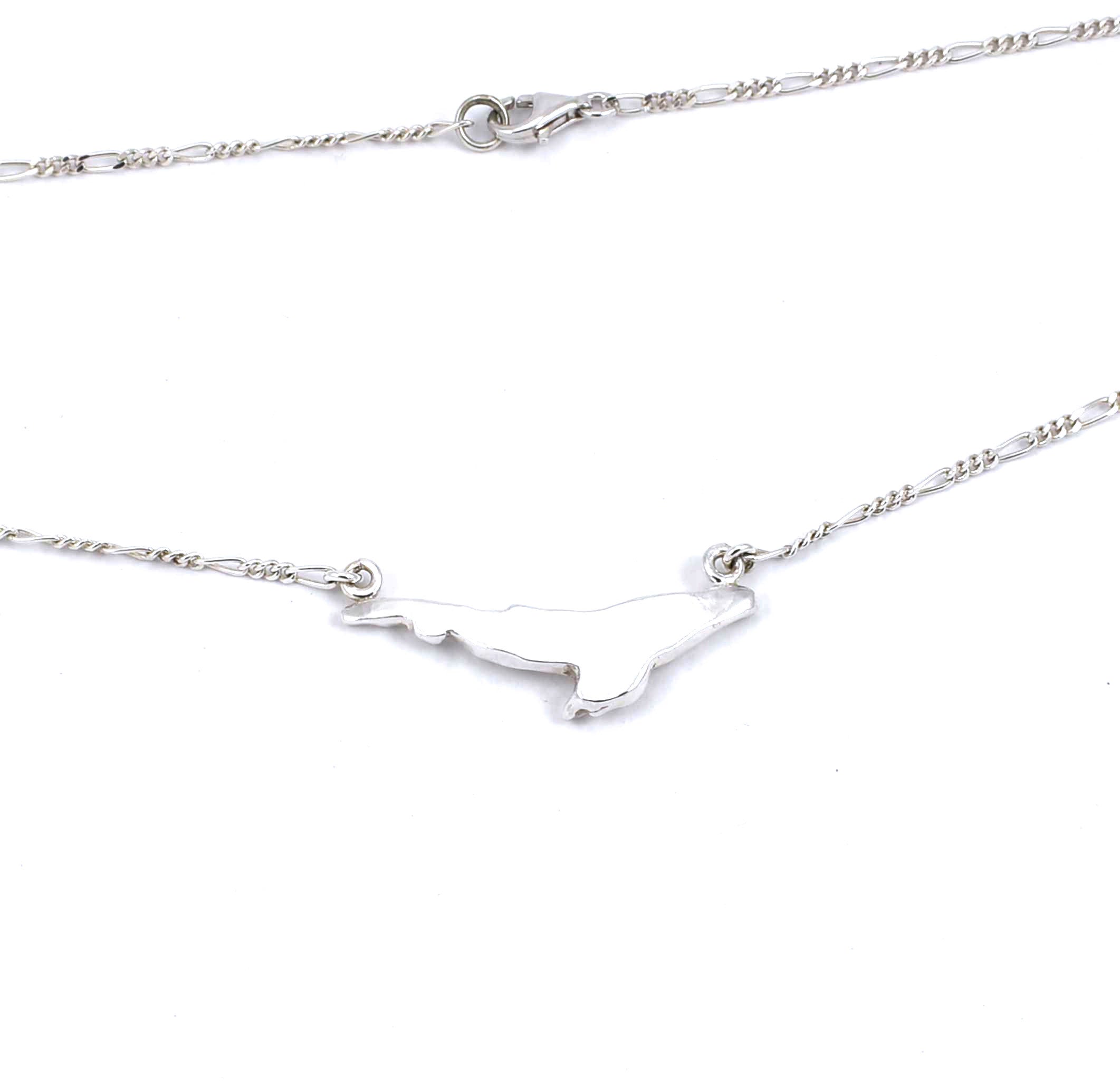 Rear view of sterling silver humpback whale pendant