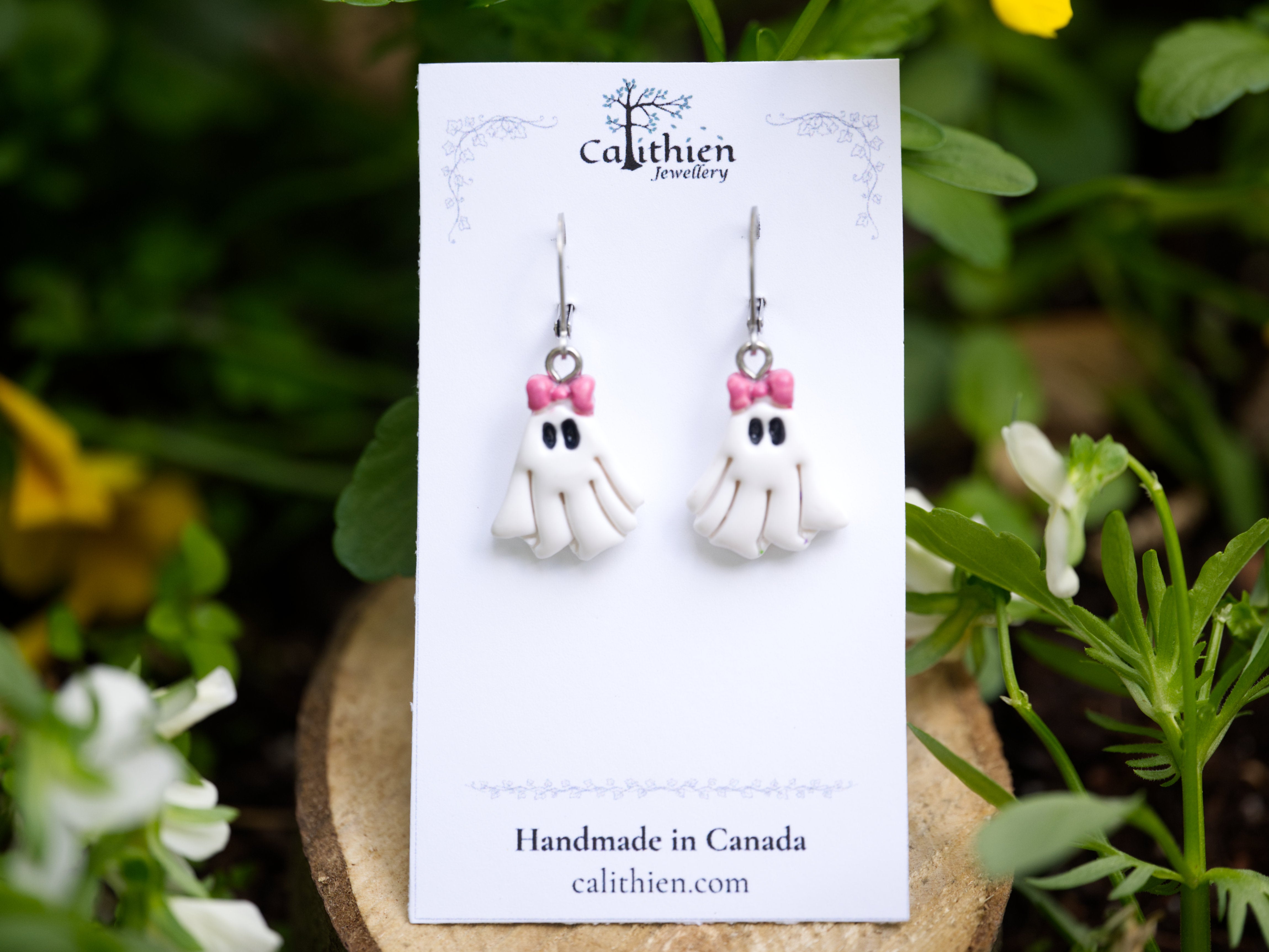 Coquette ghost leverback earrings on Calithien Jewellery branded display card reading Handmade in Canada