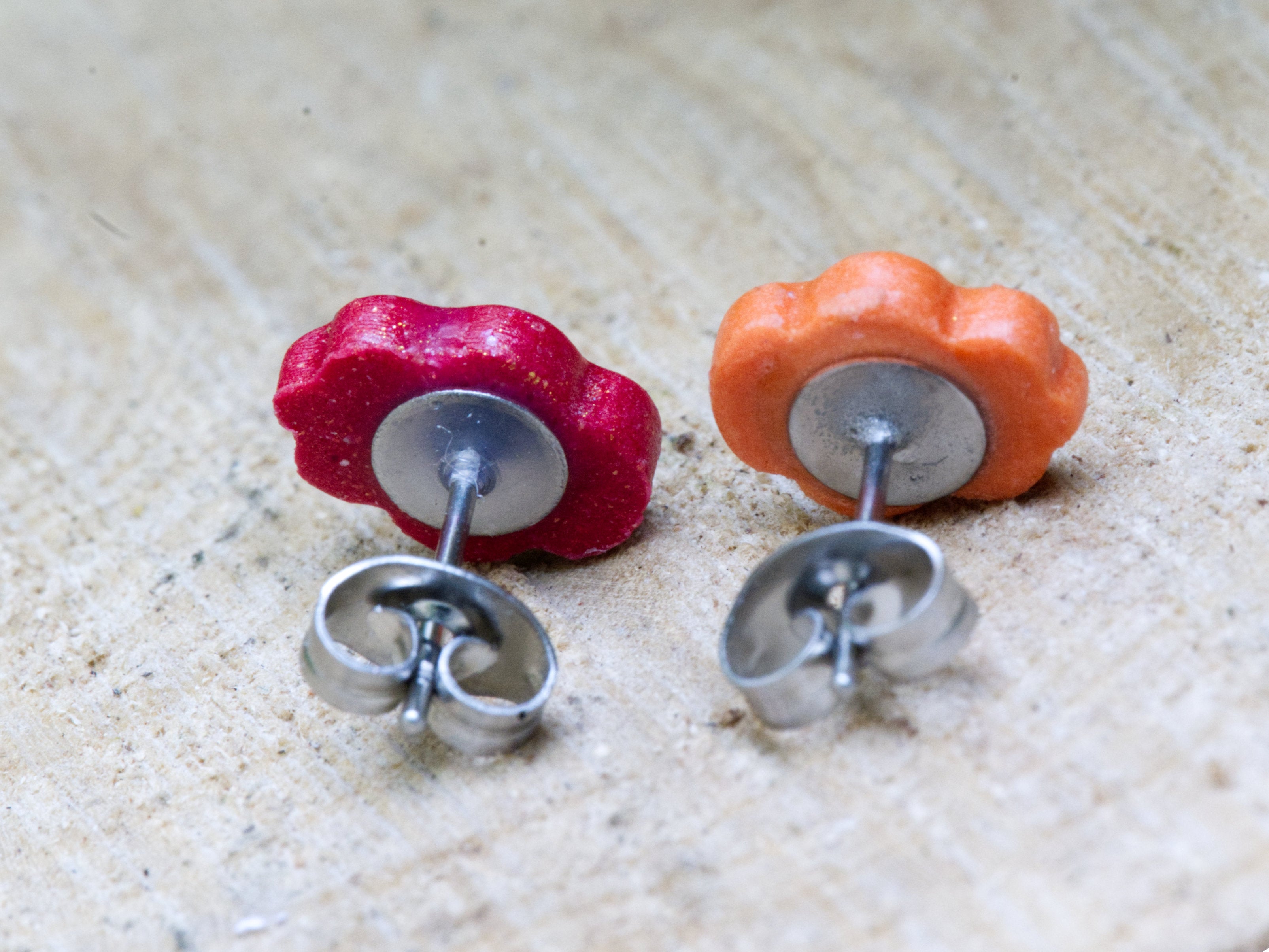 316 grade surgical steel earring post and butterfly back on orange and red polymer clay oak leaf studs