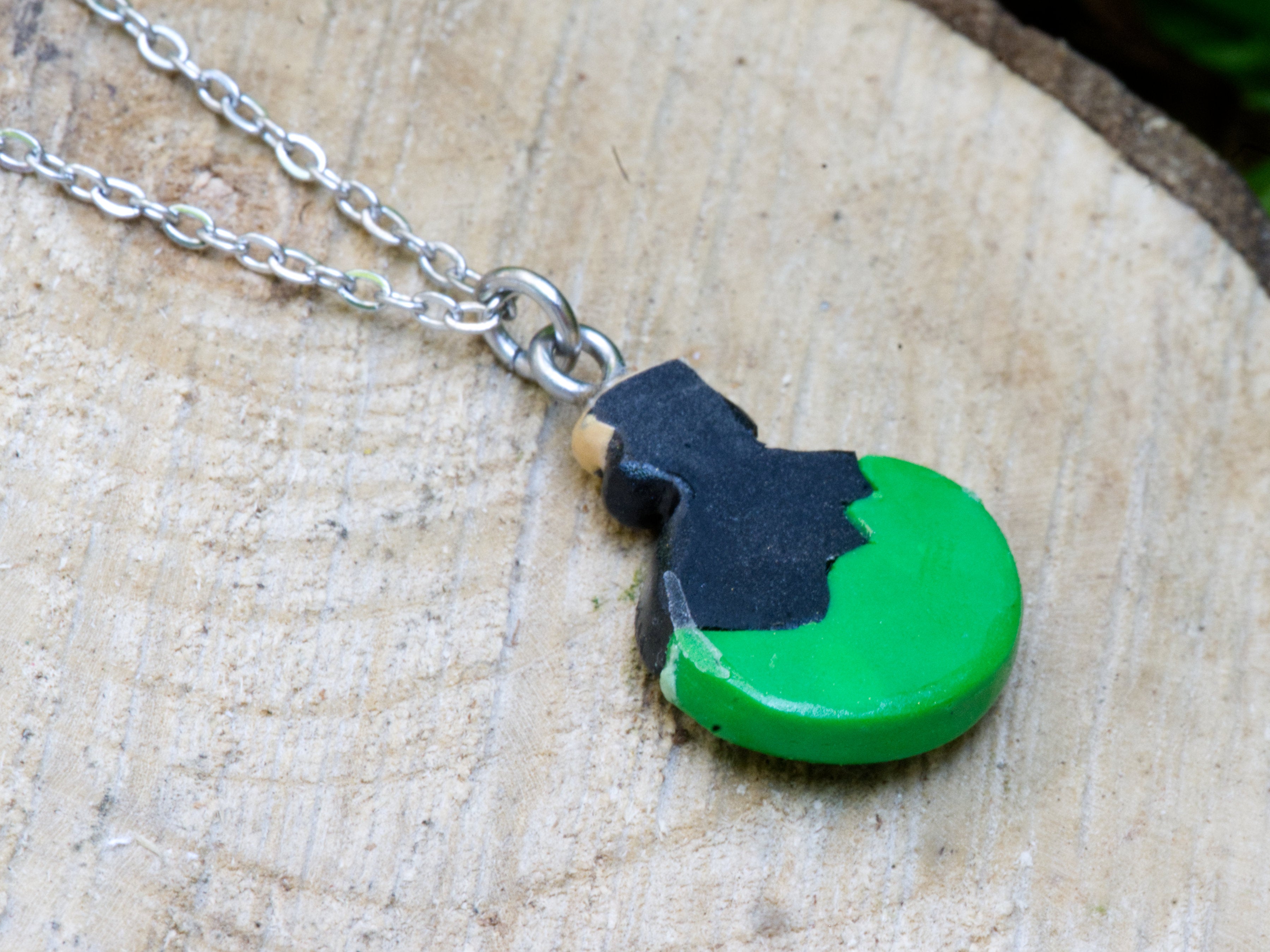 Back of polymer clay potion bottle pendant 
