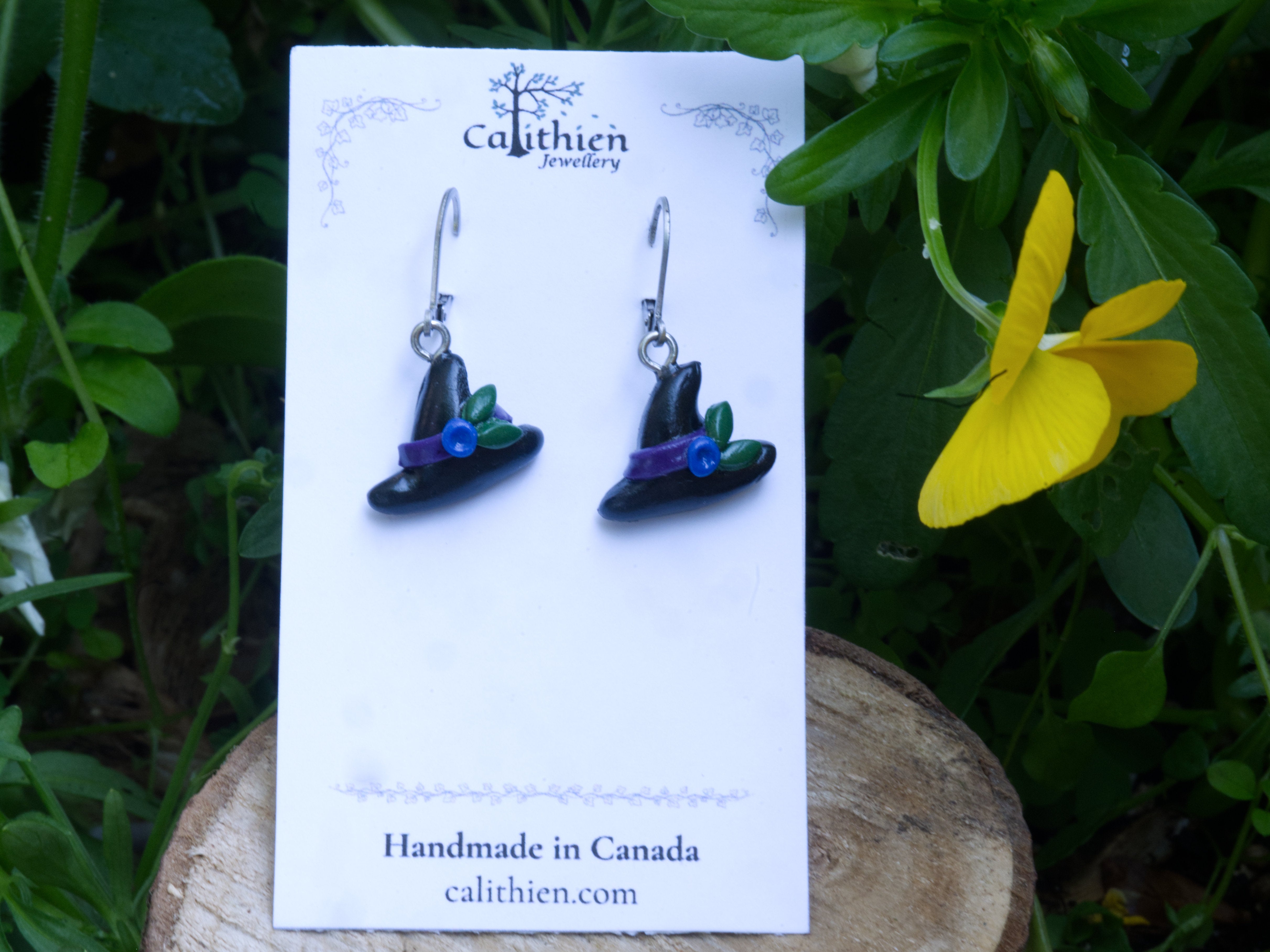 Witch hat leverback earrings on Calithien Jewellery branded display card reading Handmade in Canada