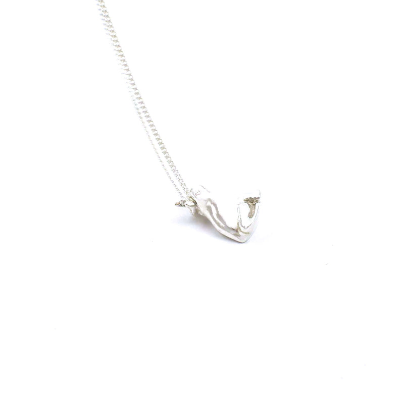 Left side view of sterling silver frog prince pendant
