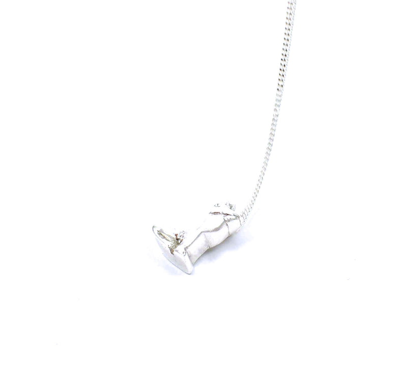 Right side view of sterling silver frog prince pendant