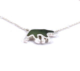 Bottom view of sterling silver bear pendant with jade gemstone inlay