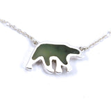 Front view of sterling silver bear pendant with jade gemstone inlay