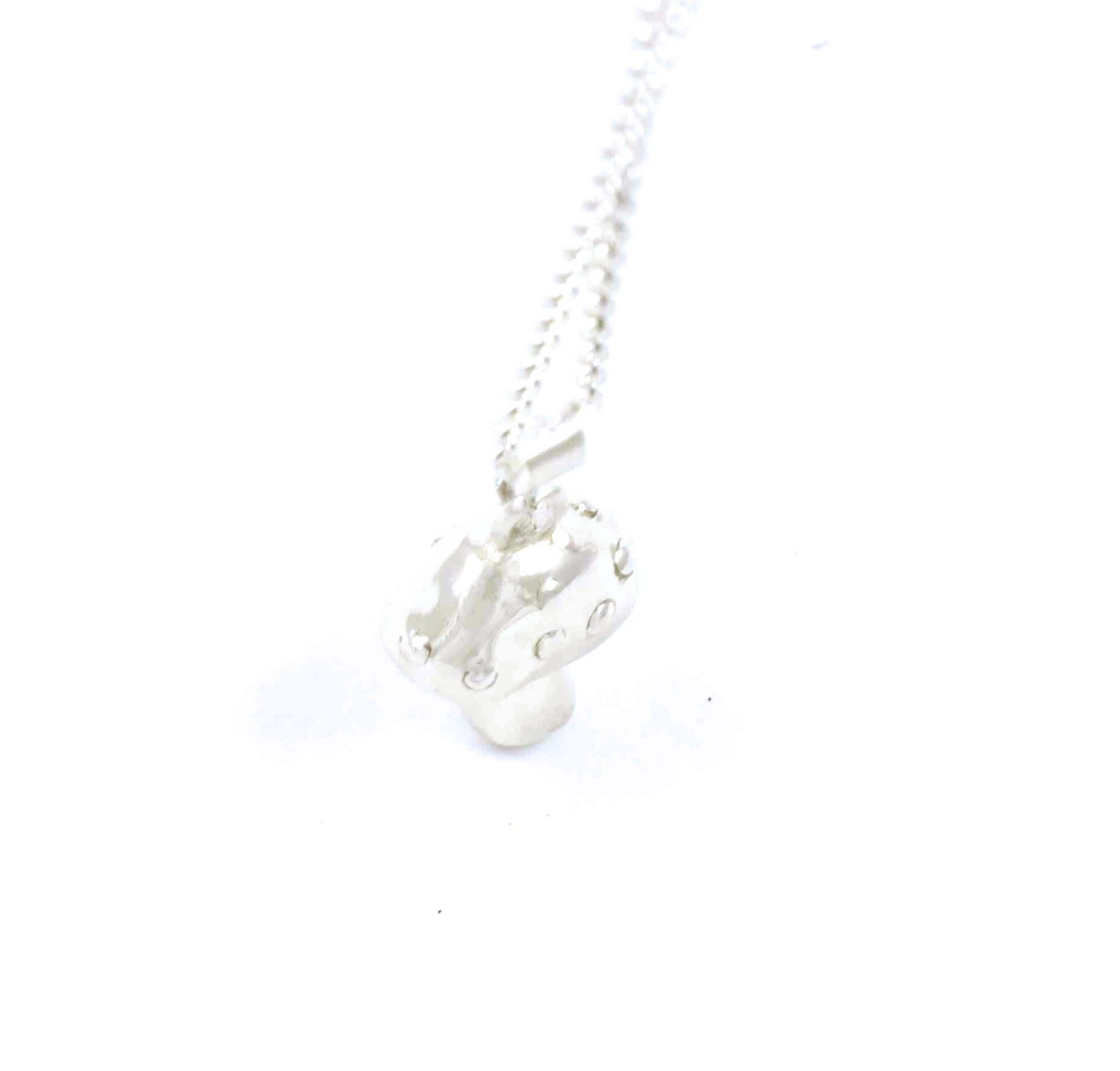 Top view of sterling silver mushroom pendant