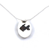 Rear view of sterling silver agate pendant with seahorse and fish accents