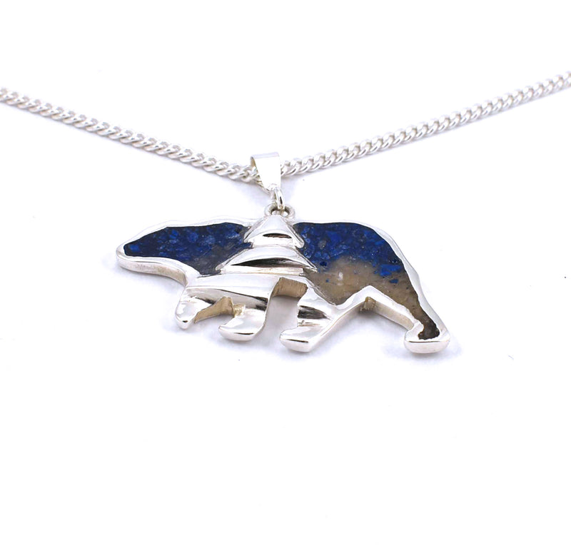 Bottom view of medium sterling silver bear pendant with tree accent and crushed gemstone inlay